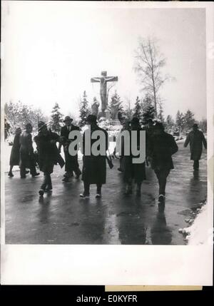 Nov. 14, 1952 - Hunting in the forest cemetery. The Munich forest cemetery is a place to hunt deer and rabbits instead of one has decided to come because the animals in their search for food and feed where the flowers from the graves. All attempts to scare away the animals were unsuccessful, and it has been observed that they really made the cemetery their winter home. Five hunters and four drivers took part in the hunt for ten hares. In the Munich old people's homes at night, there was roast hare. Stock Photo