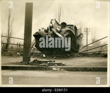 Mar. 03, 1953 - Driver killed-passengers critically injured in Mitcham C/R chase: Thirty eight year old Ronald Leslie Main of Gaildford, was killed when they car he was driving got out of control and crashed down and enbarkment, at Croydon Road, Mitcham, Surrey, early this morning.. His both of Mitchem, were seriously injured-Police Constable Coren was off duty at that time: Photo shows View of the wreckage-after the crash this morning. Stock Photo