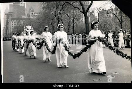 Apr. 04, 1953 - Greek Independence Day Parade in New York... Native Costumes and Laurel Garlands... Several thousands Greeks who are now American Citizens marched in parade along the Fifth Avenue New York - to celebrate - the Independence Day of their native land... The parade was headed by General James A Van Fleet who helped liberate Greece during the War... The Greek girls were dressed in their national Costume. Keystone Photo Shows: These Greek girls make a pretty Grecian frieze with their laurel garlands during the parade. Stock Photo