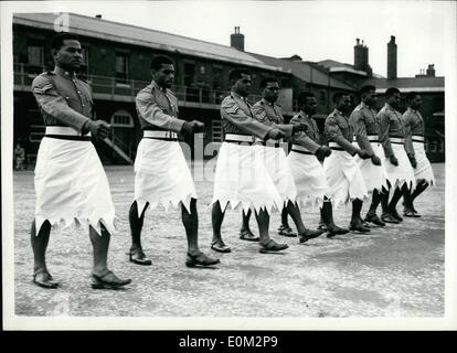 May 05, 1953 - Colonial Coronation Contingent At Woolwich: Members of the Colonial Coronation Contingent which will take part in the Coronation procession, were to be seen at the Royal Artillery Depot, at Woolwich, wearing their coronation uniforms. Photo Shows Members of the Federation Regiment of Fiji, in white skirts - seen parading in their Coronation uniforms at Woolwich today. Stock Photo