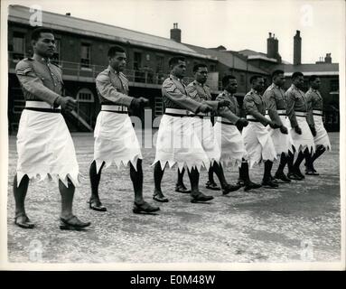 May 05, 1953 - Colonial Coronation Contingent Wear Coronation Uniform.: Member of the Colonial Coronation contingent, which will take part in the coronation return procession, were to be seen this morning at the Royal Artillery Depot at Woolwich, wearing their Coronation uniforms. Photo shows members of the Federation Regiment of Fiji, in white skirts seen parading in their Coronation uniforms at Woolwich today. Stock Photo