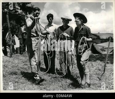 Jul. 24, 1953 - 24-7-53 The young cowboys of Dartmoor. Lasso lessons. Ex-South American cowpuncher Ross Salmon is holding a two weeks course for would-be cowboys on his School for Cowboysat Longdown, near Exster, where he hopes to start a cattle range. He plans to rear cattle in real ranching style on 25,000 of Dartmoor's lonely acres in an effort to put to use some of the wastelands of Britain. To do it he is teaching the boys to ride cowboy style and to do everything that a real Western Cowboy has to do which is rather different to the Cowboys of the Sereen Stock Photo
