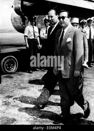 Emperor Bao Dai walking with M. Mecheri at the airport in France Stock Photo