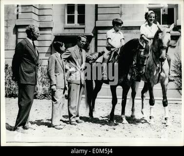 Jul. 07, 1953 - Crown Prince of Japan is guest of the Belgian Royal Family.: Crown Prince Akihito, of Japan is paying a visit to Belgium. During his stay in Brussels he was the guest of the Belgian Royal Family at Lacken Castle. Photo shows Ex-King Leopold, Crown Prince Akihito and King Baudouin of the Belgians, watch Princess Liliane, wife of ex-King Leopild, and her son Prince Alexandre, start out on their riding exercise at Lacken Palace. Stock Photo