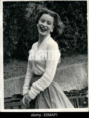 May 05, 1954 - She Wins the Title of the ''Most Kissable Girl''. Keystone Photo Shows: Maureen Knight seen after she had won the Title of the ''Most Kissable Girl in England'' at a contest held at Hastings yesterday. Judging the contest was Ken Roberts, who claimed that Maureen kissed like twelve Marilyn Monroe and Marlene Dietrich rolled into one. His reactions to the kisses of twelve finalist were shown on a ''kissometer' Stock Photo