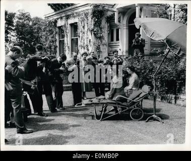 Jul. 07, 1954 - Duchess of Kent and Princess Alexandra facing the cameras.: H.R.H. The duchess of Kent and her daughter Princess Alexandra were to be seen this morning facing the camera at their home, Coppins, Iver, Bucks. Photo shows the duchess and Princess Alexandra seen as they face the battery of cameras at Coppins this morning. Stock Photo