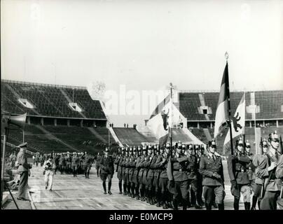 Sep. 03, 1954 - Pictured are men from the Berlin Police Units holding flags as they march into the Berlin Olympic Stadium. They Stock Photo