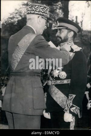 Oct. 10, 1954 - Emperor of Ethiopia on state visit in Paris: H.M. Haile Selassie receives the Military medal handed to him by General Catroux during the ceremonies this morning. Stock Photo