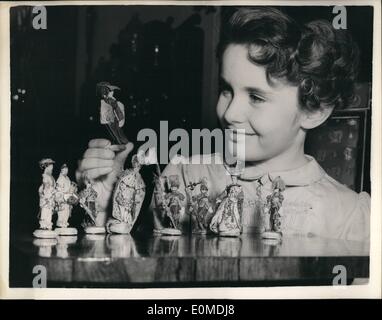 Sep. 14, 1954 - Autumn antique Dealer's Fair at Chelsea Town Hall. Needlework Chess Set. Press preview was held this afternoon at Chelsea Town Hall of the Autumn Antique Dealer's Fair. Keystone Photo Shows: Penny Makins of London seen with a unique set of Needlework Chessmen made in silk beads, and gold and silver thread, some pieces started in 1740 and the latest was made in the time of the Chinese rebellion. Stock Photo