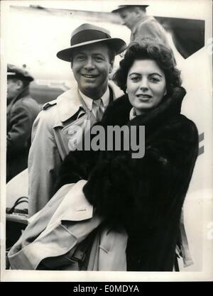 Jan. 01, 1955 - Stars Arrive From The United States For New Film In Britain; Among the arrivals at London Airport from Hollywood this morning were screen stars Miss Faith Domergue and Gene Nelson. They are to take part in their first British picture ''Time Slip'' for Anglo-Amalgamated. Photo shows Faith Domergue and Gene Nelson on their arrival at London Airport this morning. Stock Photo