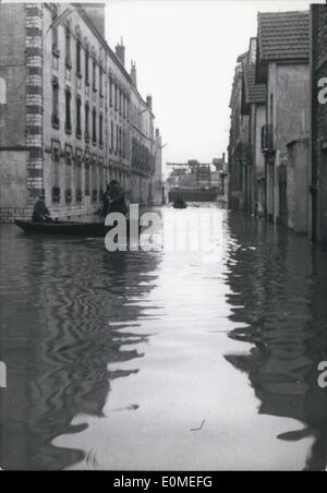 Jan. 23, 1955 - Floods in Paris. One of the Paris Suburbs completely flooded as a result of the Overflow of the seine. Inhabitants move about in boats. Stock Photo