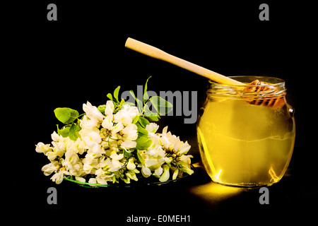 Pure acacia honey is very popular and coveted. Stock Photo