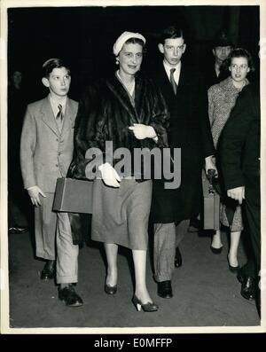 Dec. 12, 1954 - Duchess of Kent and family leave for Sandringham: H.R.H. the Duchess of Kent was accompanied by her sons tye Duke of Kent and Prince Michael - and their sister Princess Alexandra when she left King's Cross for Sandringham to spend Christmas with the Queen this afternoon. Photo shows the Duchess of Kint and her family making their way to the train - at King's Cross Station this afternoon. Stock Photo