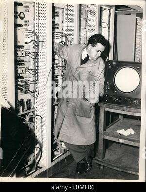 Mar. 03, 1955 - Press Visit To Southern Air Traffic Control Center At London Airport: A press visit was held today at London Airport to the new Southern Air Traffic Control Center which is to replace the existing center at Uxbridge. It has specially been designed to cope with the Air Traffic for the whole of Southern England airways and radar control.Photo shows Radar Technician testing the data generator racks. Theses racks supply information to the Operation Room Radar Indicators from the two Long Range radars. Stock Photo