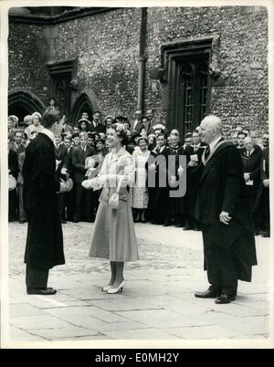 Jul. 07, 1955 - Royal visit to Winchester. Queen presents a medal for Latin. Photo shows H.M. the Queen in a happy mood as she presents a medal for Latin to Mr. A.L.M. Watt at Winchester College yesterday during her official visit to the city of Winchester. Stock Photo