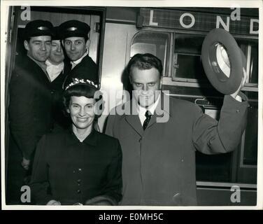 May 05, 1955 - Billy Graham arrives in London. Crusade opens at Wembley.: Billy Graham the United States Evangelist - arrived at Euston from Scotland this afternoon. His London Crusade opens at Wembley Stadium on Saturday. Photo shows Billy Graham and his wife - on his arrival at Euston Station this afternoon. Stock Photo