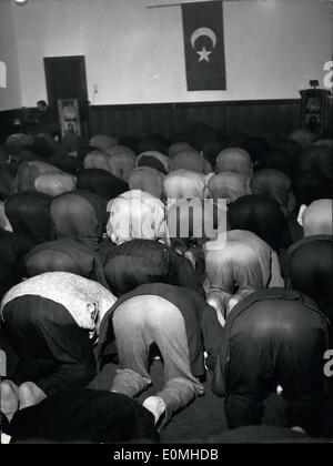 Jul. 07, 1955 - Nearly 1,000 muslims bowed their heads this morning at the German Museum to pray from Munich to Mecca for the biggest holiday in the Islamic calendar year, the Kurban Bayram. 3,000 muslims live in West Germany currently, 1,000 of which are in Munich. Wr Stock Photo