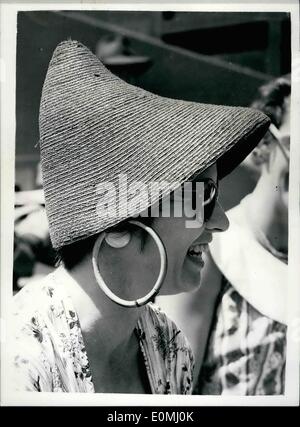 Jun. 06, 1955 - Wimbledon Tennis Tournament - Fifth Day: Photo shows Mrs. Betty De Mare, of Sevenoaks, wears this striking straw hat with large rings attached. Stock Photo