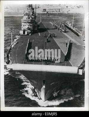 Sep. 09, 1955 - Angle of an angle: h.M.s. Centaur was the first British flattop to be fitted with the angled deck, the British invention that was adopted by the U.S. navy. she also has the British-invented mirror landing aid, robot which replaces the bateman in landing aircraft. Photo shows a low flying photographer provides a new angle on H.M.S. Centaur as she leaves Grand Harbour, Malta, for exercises. Ship's company is lined up on the flight deck and Seahawks of Squadrons 806 and 803 are on the angled deck. Stock Photo