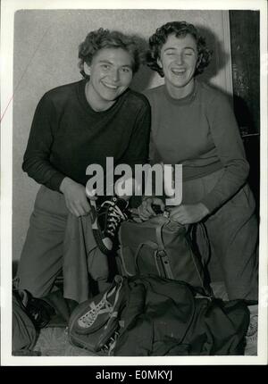 Oct. 10, 1955 - 12-10-55 Czechoslovakian athletes arrive for London-Prague Meeting. Keystone Photo Shows: Unpacking at their hotel on arrival in London last night are Czech women athletes B. Mullerova and K. Navratilova. They are taking part in the London-Prague athletic meeting at the White City this evening. Stock Photo
