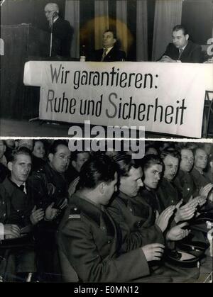 Dec. 21, 1955 - The Police-trade-union of Nordrhein-Westfalen ( a German federal district) made a big demonstration meeting asking for some more money. The meeting in a protest against the federal government of Nordrhein-Westfalen took place at Cologne today. The meeting should be connected with a demonstration-march in the streets, but the marching was forbidden. Photo Shows: We give guarantee silence an savety. Other picture: Policemen applauding. Stock Photo