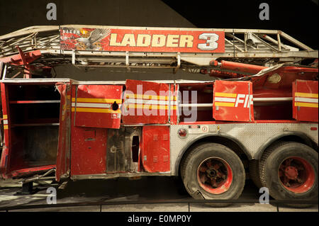 New York, NY, USA. 15th May, 2014. A firetruck in the National September 11 Memorial Museum was crushed when the Twin Towers were destroyed on Sept. 11, 2001. The museum opened on May 15, 2014. (Photo: Terese Loeb Kreuzer) Credit:  Terese Loeb Kreuzer/Alamy Live News Stock Photo