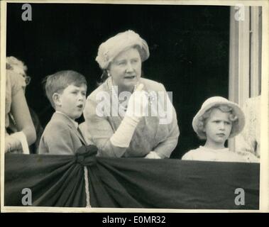 May 05, 1956 - Prince Charles and Princess Anne look on their mother to come riding up the all. Photo shows the Queen Mother talks to the Royal Children on the balcony of Buckingham Palace this morning as they wait for the Queen to come riding down the all to take the salute outside Buckingham Palace. Stock Photo