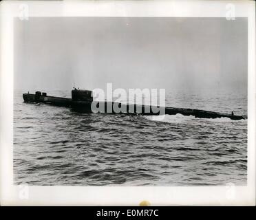 May 05, 1956 - Navy Gets Peroxide Sub. Recently delivered to Britain's Royal Navy was an experimental submarine called the Explorer which uses hydrogen peroxide as a booster to her diesel electric engines. She has high underwater speed and will be used as a fast underwater target for training surface forces. OPS: H.M.S. Explorer surfaced. Men on the conning tower give an idea of her 225 ft. 6 in. length and 15 ft. 8 in. breadth. Stock Photo