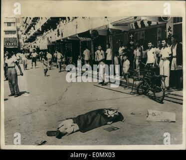 Oct. 10, 1956 - Chinese Nationalists Riot In Hong Kong. Victim In The Street: Photo shows A Chinese victim lies in the street draped with a Nationalist ''Free China'' flag - during the Chinese Nationalists riots which created hav in the streets of Kowloon, Hong Kong, recently. Many people were killed and hundreds injured. Stock Photo