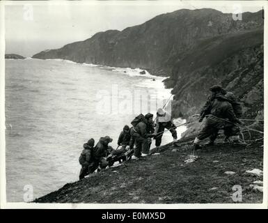 Aug. 02, 1956 - 2-8-56 Royal Air Force Mountain Rescue Team in training. Combined exercise in Angelsey. Men of the Royal Air Force Mountain Rescue Team were to be seen in training on the Holyhead Mountain, Anglesey, part of the combined search and rescue operations of the RAF. All members of the teams age volunteers drawn from all branches and trades of the service, and are all enthusiastic climbers. Other parts of the exercises which was to have included the use of vessels and helicopters was cancelled owing to the gale force winds. Keystone Photo Shows: Flying Officer G.N Stock Photo