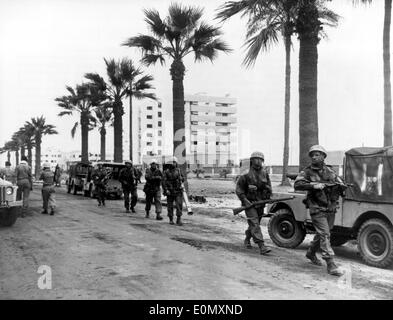British soldiers marching in Port Said during Suez Crisis Stock Photo