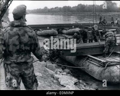 Oct. 30, 1956 - The Munich Pioneers Teaching Battalion laid a pontoon bridge across the Donau/Danube river near Ingolstadt. It was the first time, post WW2, that the pioneers had taken up an exercise like this. Our picture shows a moment in the laying of the bridge, which was 100m long and took 50 minutes to build. Stock Photo
