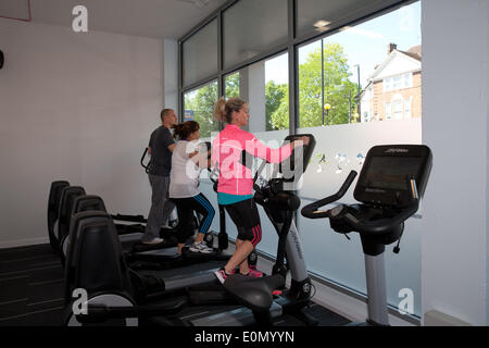 Orpington, UK. 16th May, 2014. Members try out the machines at the newly opened Anytime Fitness in Orpington, Ken Credit: Keith Larby/Alamy Live News Stock Photo