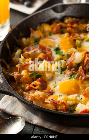 Homemade Hearty Breakfast Skillet with Eggs Potatoes and Bacon Stock Photo