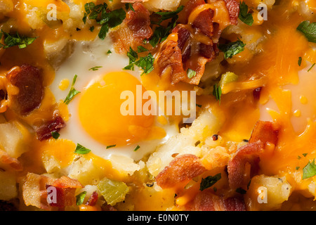Homemade Hearty Breakfast Skillet with Eggs Potatoes and Bacon Stock Photo