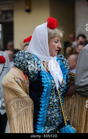 Madrid, Spain. 15th May, 2014. Fiesta de San Isidro, Madrid Credit:  Jennifer Booher/Alamy Live News. Woman in traditional chulapa dress. Stock Photo