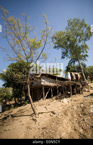 A Murong tribal hut in Baganpara village in the Bandarban region of ...