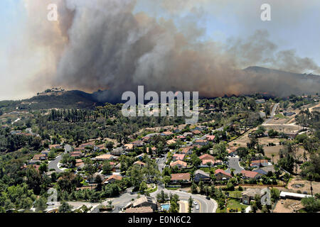 Aerial view of the Cocos wildfire as it burns the foothills destroying home May 15, 2014 around San Marcos, California.  Evacuations forced more than 13,000 people from their homes as the fire burned across San Diego County. Stock Photo