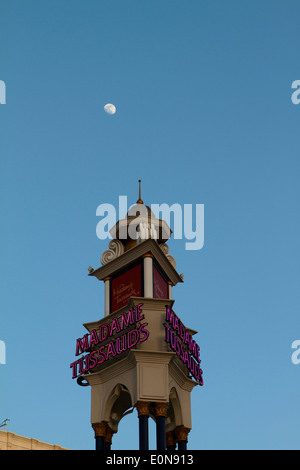 Moon rising over Madame Tussauds Located inside the Venetian hotel casino in Las Vegas Nevada Stock Photo