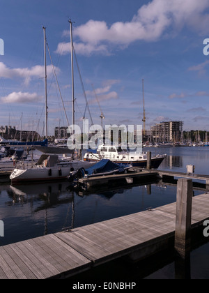 Neptune marina with extensive building work and cranes in the distance during dockside redevelopment / regeneration, Ipswich Stock Photo