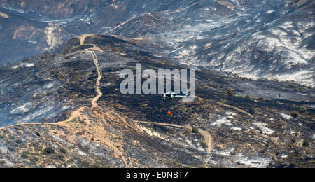 San Diego, California, USA. 16th May 2014. 16th May, 2014. A water bomber helicopter battles the wildfire in San Diego, south California of the United States, May 16, 2014. Credit:  Yang Lei/Xinhua/Alamy Live News Stock Photo