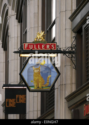 Picture of a pub sign outside the Cat and Canary bar in Canary Wharf Stock Photo
