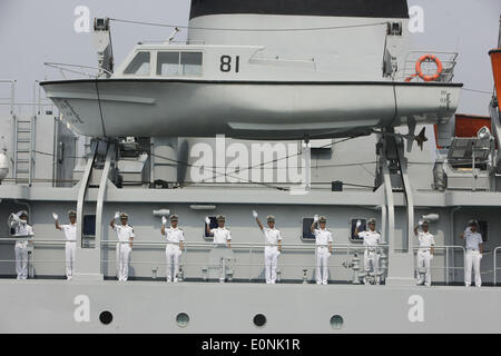 (140517) -- VISAKHAPATNAM, May 17, 2014 (Xinhua) -- Crew members of Chinese Navy training vessel Zhenghe wave hands as they arrive at port of Visakhapatnam in east Indian on May 17, 2014. Chinese Navy training vessel Zhenghe and missile frigate Weifang arrived in port of Visakhapatnam in east Indian and started a 4-day visit on Saturday. (Xinhua/Zheng Huansong) (djj) Stock Photo