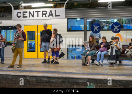 Sydney Australia,Central Station,Sydney Trains,platform,riders,passenger passengers rider riders,commuters,waiting,AU140310257 Stock Photo