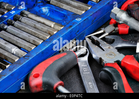 Various tools laying on a table Stock Photo