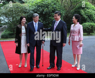 Shanghai, China. 18th May, 2014. Chinese President Xi Jinping (2nd R) holds a welcoming ceremony for visiting Kyrgyz President Almazbek Atambaev (2nd L) before their talks in Shanghai, east China, May 18, 2014. Credit:  Lan Hongguang/Xinhua/Alamy Live News Stock Photo
