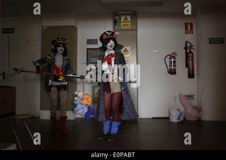 Madrid, Spain. 18th May, 2014. Cosplayers, Elena, middle and Belen, left get ready and prepare to participate in the Cosplay competition at the ''Expomanga'' event in Madrid, Spain, May 18th 2014. Expomanga is a national event that gather cosplayers and fans of the japanese culture from all around Spain during three days in Madrid. At the Cosplay competition participants compete for the best dress or cosplay. Credit:  Rodrigo Garcia/NurPhoto/ZUMAPRESS.com/Alamy Live News Stock Photo