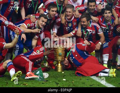 Berlin, Germany. 17th May, 2014. German DFB Cup final. Borussia Dortmund versus Bayern Munich. Franck Ribery (Bayern Munich), and David Alaba (Bayern Munich) with the cup Credit:  Action Plus Sports/Alamy Live News Stock Photo