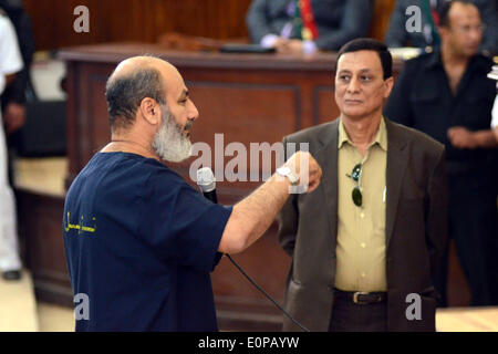 Cairo, Egypt. 18th May, 2014. Egyptian Muslim Brotherhood preacher Safwat Hegazy talks to his judges during his trial in the capital Cairo on May 18, 2014. An Egyptian court today sentenced 126 supporters of ousted Islamist president Mohamed Morsi to 10 years in prison each over protest violence, judicial sources said Credit:  Mohammed Bendari/APA Images/ZUMAPRESS.com/Alamy Live News Stock Photo