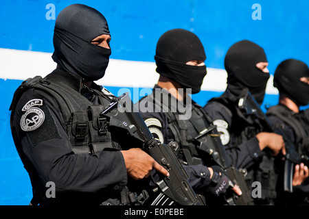 Members of the specialized Police anti-gang unit pose for pictures before leaving for an operation in San Salvador, El Salvador. Stock Photo